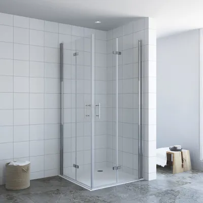 A modern bathroom with a glass shower enclosure.