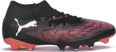 A side view of a black Puma soccer cleat with a pink and orange patterned design on the toe box and a red sole.