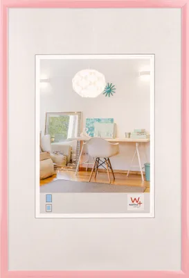 A pink picture frame containing an image of a home office/living space.