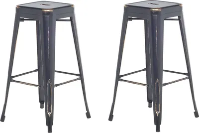 Two black metal bar stools with gold accents are shown against a white background.