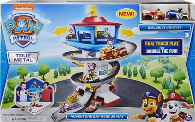 The image shows the packaging of a Paw Patrol True Metal Adventure Bay Rescue Way playset.