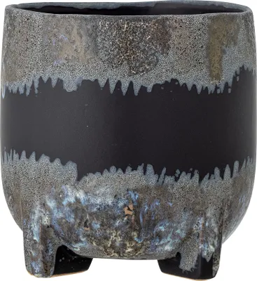 A close-up studio shot of a black ceramic planter with a speckled gray and blue glaze.