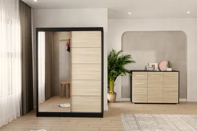 A bedroom or dressing room setting with a large wardrobe and a dresser.