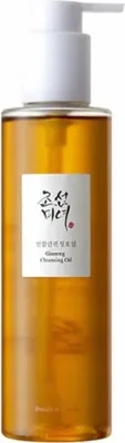 A bottle of cleansing oil with a pump dispenser.