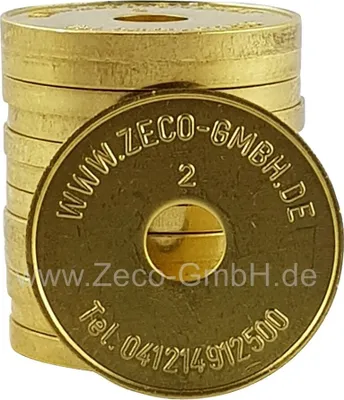 A stack of golden tokens with text and a number printed on them.