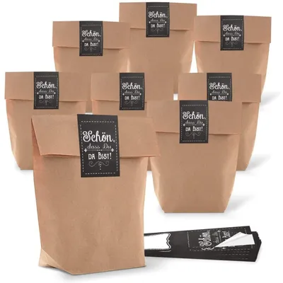 Produktbild von Logbuch-Verlag 5 x kleine Gastgeschenk Verpackung Geschenktüte Papiertüte SCHÖN DASS DU DA BIST Aufkleber schwarz weiß braun Give-Away Partytüte Hochzeit Papierbeutel Kraftpapier"Schön, dass du da bist" schwarz / 25 Stück