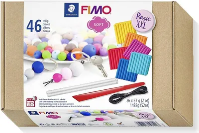 The image shows the packaging of a FIMO soft Basic XXL modeling clay set, featuring various colors of clay and some accessories.