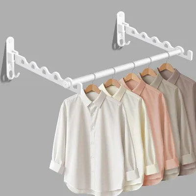 Imagen del producto de Ganchos plegables para colgar ropa, para montaje en pared - 2 unidades + barra