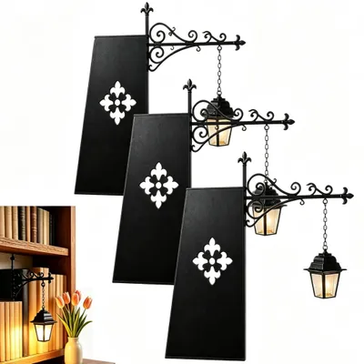 Produktbild von 3er Vintage Buchstütze mit Laterne & warmem LED-Licht – kabellos, dekorativer Buchblock, Metallbügel – für Bücherregal, Wohnzimmer & Leseecke