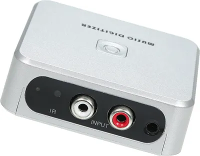 A silver music digitizer device with input ports and text on the top.