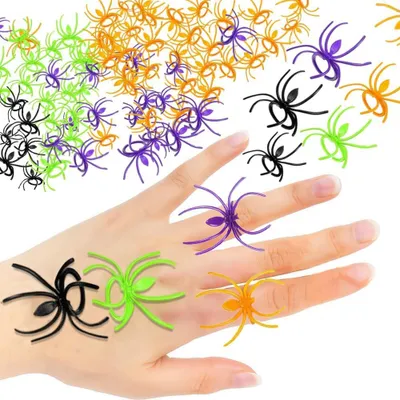 Productafbeelding van Kunststof spinnen, spinnenringen en decoraties voor Halloweenfeestjes, 120 stuks