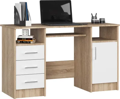 A product shot of a desk with a laptop and office supplies.