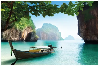 Produktbild von Wallario Wandbild aus Acryl, 90 x 60 cm, freischwebende Optik - Fischerboot in Thailand  blaues Meer und Steinfelsen
