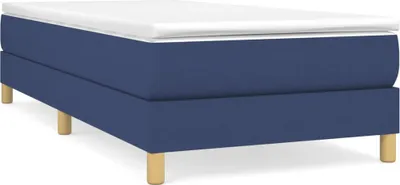 A blue boxspring bed frame with a white mattress topper and wooden legs, shown on a white background.
