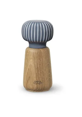 A single pepper mill on a white background.