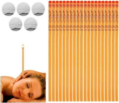 A woman receiving an ear candling treatment, with a bundle of ear candles and cotton balls in the background.