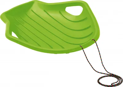 A green plastic sled with a rope attached, isolated on a white background.