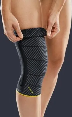 Produktbild von Kniebandage Genumedi E+motion 3.0 schwarz-gelb>>>>Gr. II