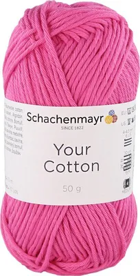 A ball of pink yarn with a label.
