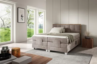 A bedroom scene with a bed, windows, and decor.