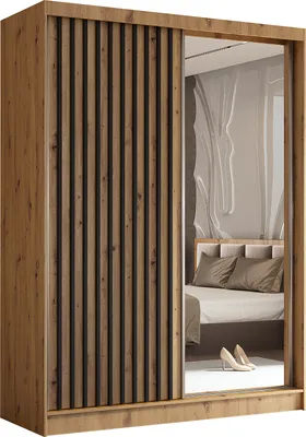 A wardrobe with sliding doors, one of which is a mirror reflecting a bedroom scene.