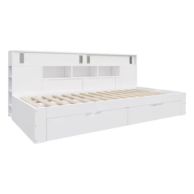 A white daybed with storage drawers and a headboard with shelves, shown from a three-quarter angle against a white background.