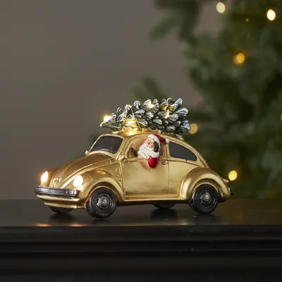 Zdjęcie produktu dla Scenka świąteczna św. Mikołaj w Garbusie Led MERRYVILLE