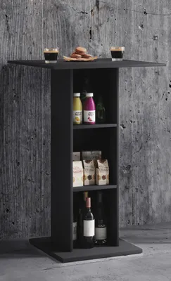 A black bar table with shelves, set against a textured gray wall.