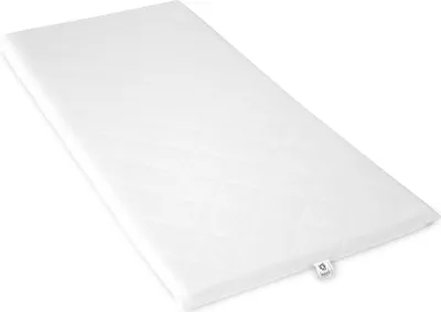 A white mattress topper is shown on a white background.