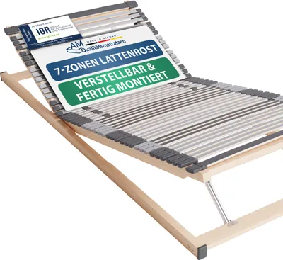 A wooden bed frame with a slatted base, tilted upwards.