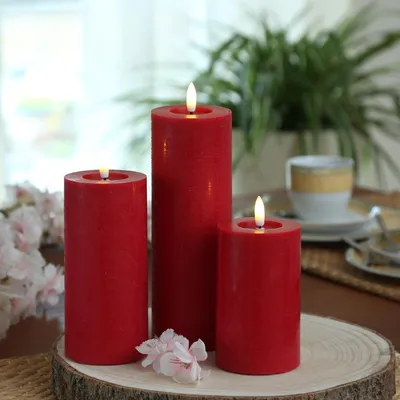 Produktbild von LED Kerzenset LINA - Rustik-Optik - Echtwachs - 3 Größen - D: 7cm - Timer - rot - 3er Set