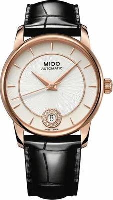 A studio shot of a women's wristwatch with a white dial, rose gold case, and black leather strap.