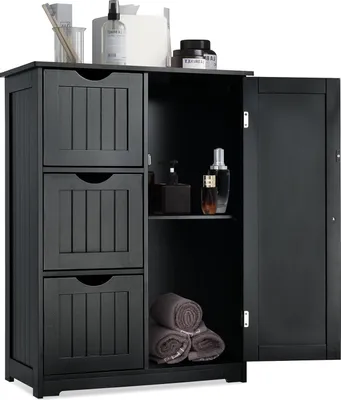 A black wooden bathroom cabinet with three drawers on the left and a door on the right, revealing shelves with toiletries and towels.