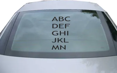 Produktbild von Indigos UG - Aufkleber Heckscheibe & Motorklappe DE7137 - schwarz - 600x340 mm - ABCDEFOAIJKLMN - Auto Scheiben Fenster Heckklappe Tuning Racing JDM - Die cut