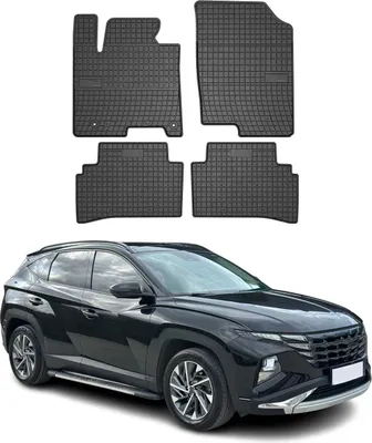 A set of black rubber floor mats arranged above a black Hyundai Tucson.