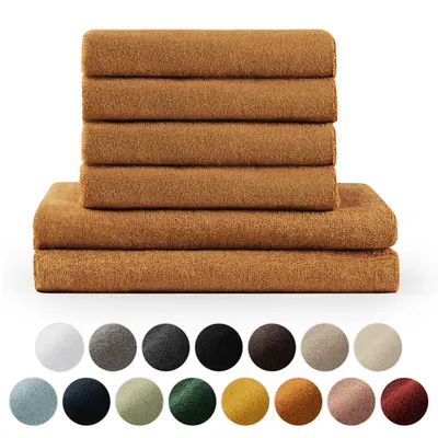 A stack of folded towels and a single towel laid flat, with a row of color swatches below.