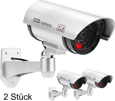 Produktbild von Kamera Attrappe im 2er Set, Dummy Kamera mit rot blinkender LED und Objektiv, schwenkbar, täuschend echt für Wand- Deckenmontage. Silberfarben. 2 Stück im Set