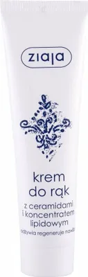 A white tube of hand cream with blue text and a decorative blue pattern.