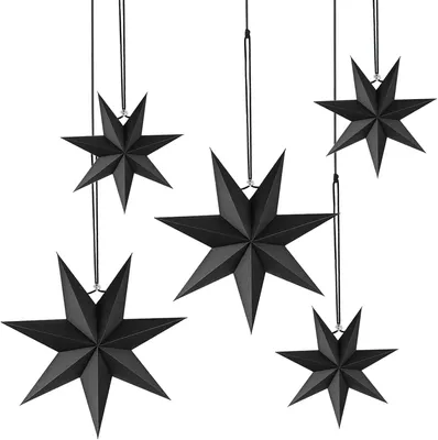 Five black paper stars hanging against a white background.