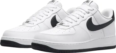 A pair of white Nike Air Force 1 '07 sneakers with black accents.