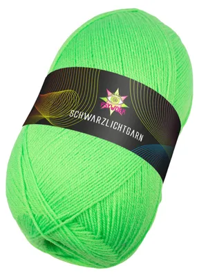 A ball of neon green yarn with a black label wrapped around it.