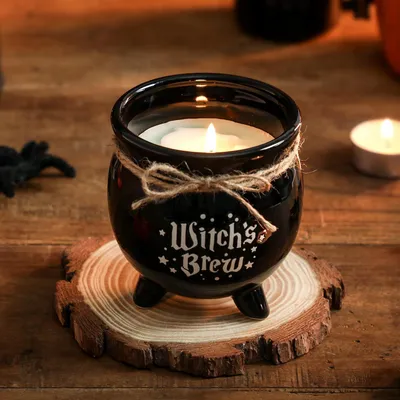 Obrázok produktu pre Halloweenová sviečka "Čarokladný kotol" s motívom ducha a tekvice, vôňa škorice, 230g, sójový vosk