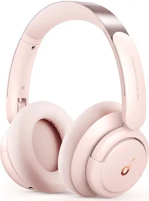 A pair of pink over-ear headphones with rose gold accents, presented on a white background.
