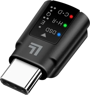 A black USB-C to 3.5mm audio adapter with indicator lights and branding.