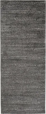 A close-up, full-frame shot of a rug with a striped pattern.