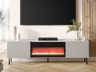 A modern TV stand with a built-in fireplace is shown in a living room setting, with a large TV mounted above it.