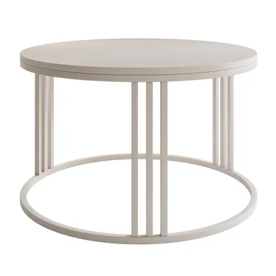 A round coffee table with a light-colored top and a matching base.