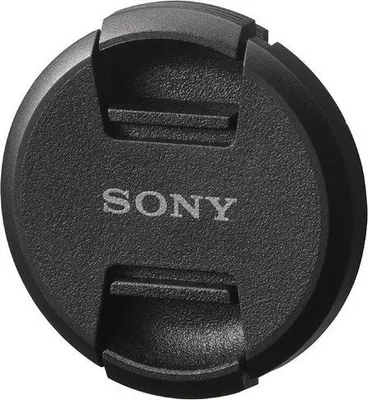 A black Sony lens cap with the Sony logo in the center.
