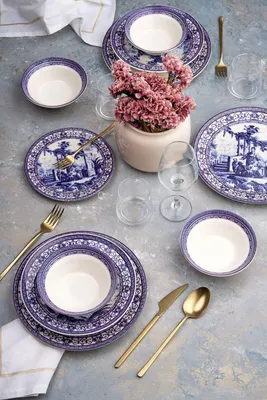 Produktbild von Hermia Concept, Hochwertiges 24-teiliges Geschirrset, 100% Keramik, Blau und Weiß | 6 Servierplatten (25x25x2,5 cm), 6 Teller (21x21x3,5 cm), 6 Schalen (14x14x4,5 cm), 6 Dessertteller (19x19x2 cm) | Spülmaschinen- und mikrowellenfest.