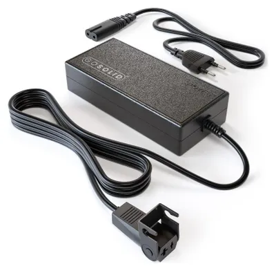A black power adapter with cables and connectors, shown on a white background.